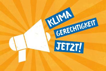 Kampagnensujet: Megafon und Text «Klimagerechtigkeit jetzt!»
